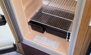 https://www.outdoorbits.com/wp-content/uploads/2023/04/remove-a-dometic-rv-refrigerator.jpg