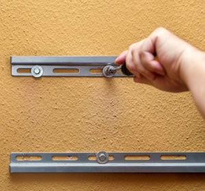 Install-the-mounting-brackets-to-attach-a-tv-mount-to-an-rv-wall