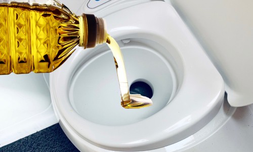 Pour-Cooking-Oil-Into-the-Rv-Toilet