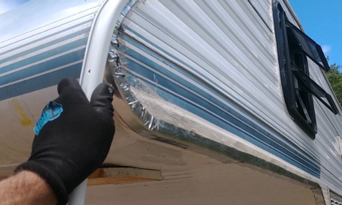 Position-the-replacement-trim(s)-on-the-RV-corner